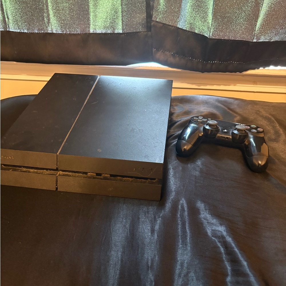 Playstation 4: Sony Black Console for Ultimate Gaming Experience